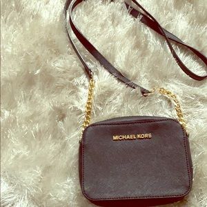 Small Michael Kors cross body bag. Authentic